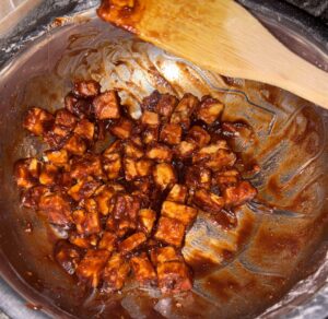 adding bbq to the fried paneer
