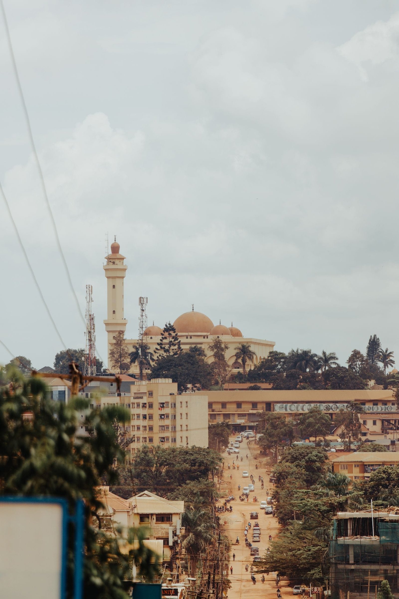 Aerial view of Kampala showcasing its iconic mosque amidst the urban landscape.